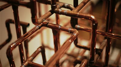 A maze of copper plumbing pipes; photo courtesy Kara Masterson